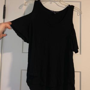black shirt with shoulder cutouts